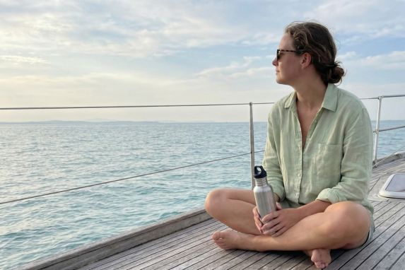 Woman who has found relief from seasickness during her Maui whale watching in December tour.